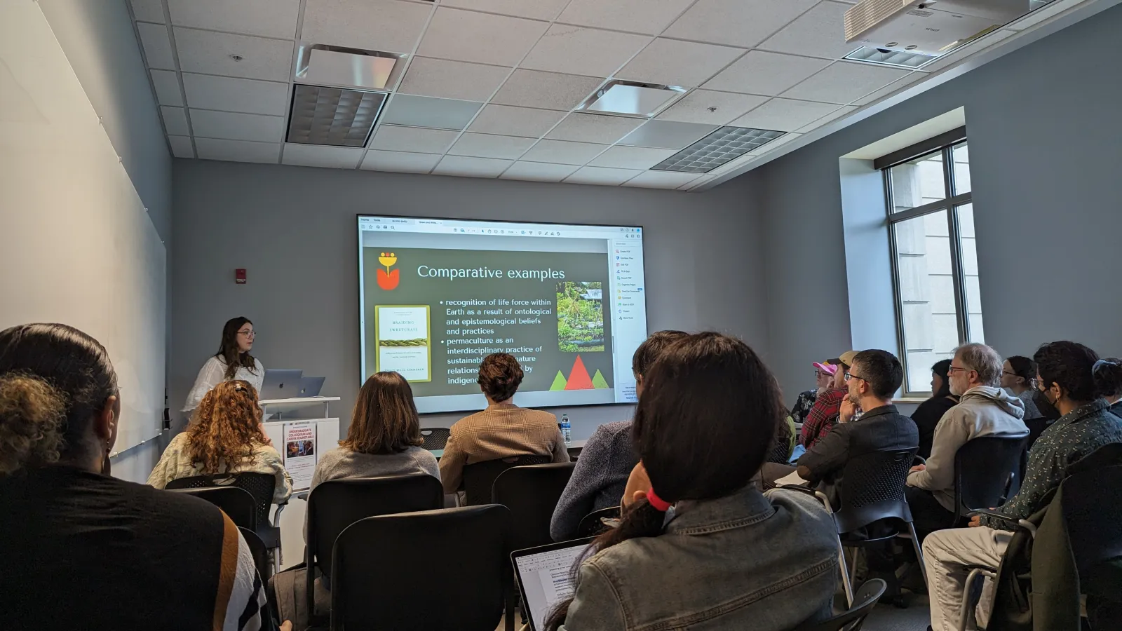 Student presenting research at Colloquium