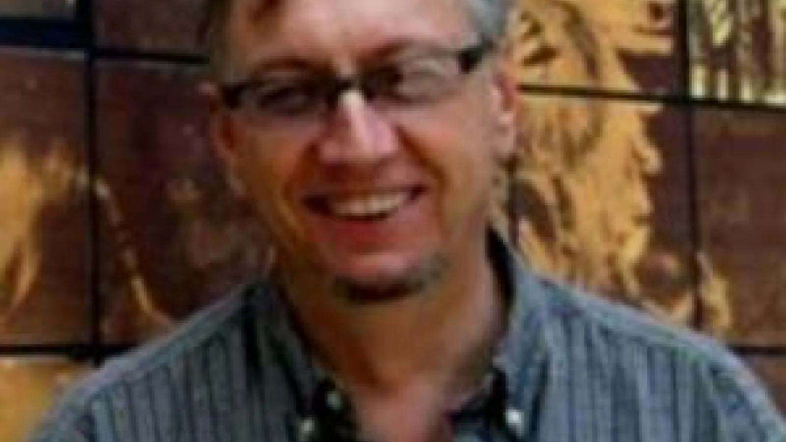 headshot of John Low