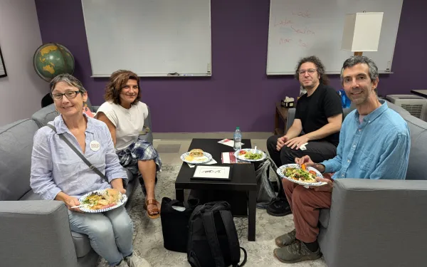 faculty and graduate students with food