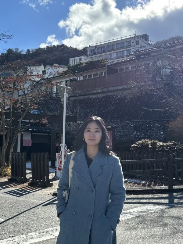 Woman standing in front of a building 
